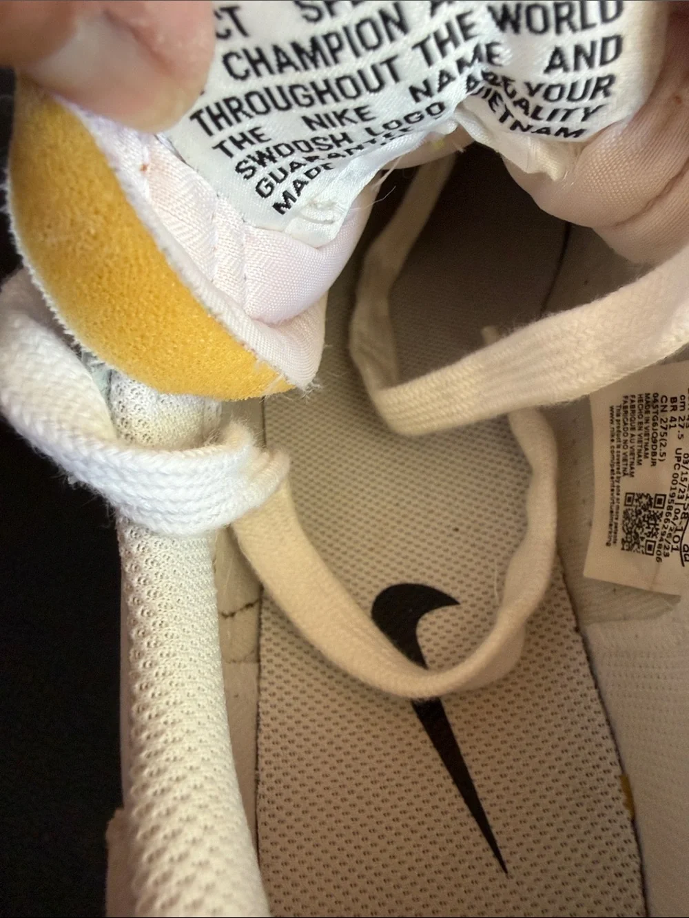 Nike White Sneakers with Neon Yellow Tongue Tab and Orange Swoosh